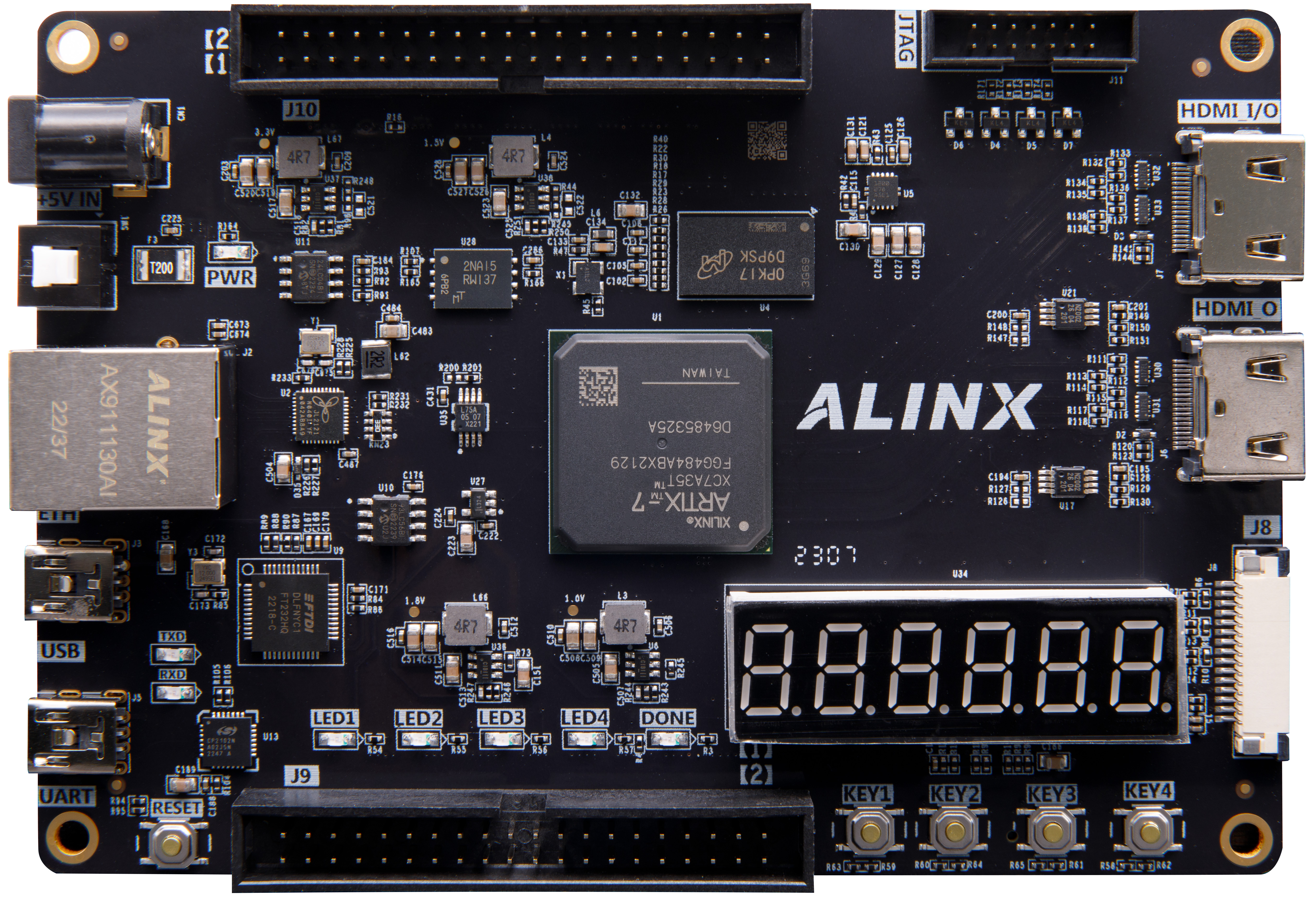 图片展示了一块AX7035B开发板，其正面印有ALINX的标志，中央是ARTIX-7 FPGA芯片。开发板上还标有“2307”字样，右侧有一个七段数码管显示“000000”。开发板周围布满了各种接口和电路元件，包括HDMI输入输出接口、USB2.0接口、UART接口、下载器接口和两路40针扩展口等。这张图片在文档中用于展示AX7035B开发板的外观和主要接口，帮助读者了解其功能和设计特点。
