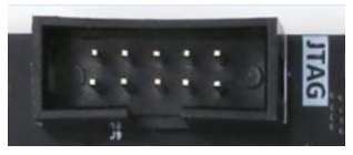 图片显示了一个JTAG接口的实物图，接口上标有“JTAG”字样，接口内有多个孔位，排列整齐。该图在文档中用于展示JTAG接口的外观，为后续对JTAG接口的详细描述提供直观参考。