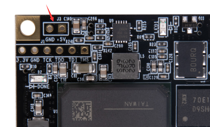 图片内容:图片显示了AX7101开发板上的J3接口实物图,其中PIN1脚连接+5V电源,PIN2脚连接地线。图片中还标有红色箭头,指向J3接口的PIN1脚,以示其重要性。 图片作用:该图片用于直观展示J3接口在开发板上的实际位置和连接方式,帮助用户正确连接电源,确保核心板能够独立工作。